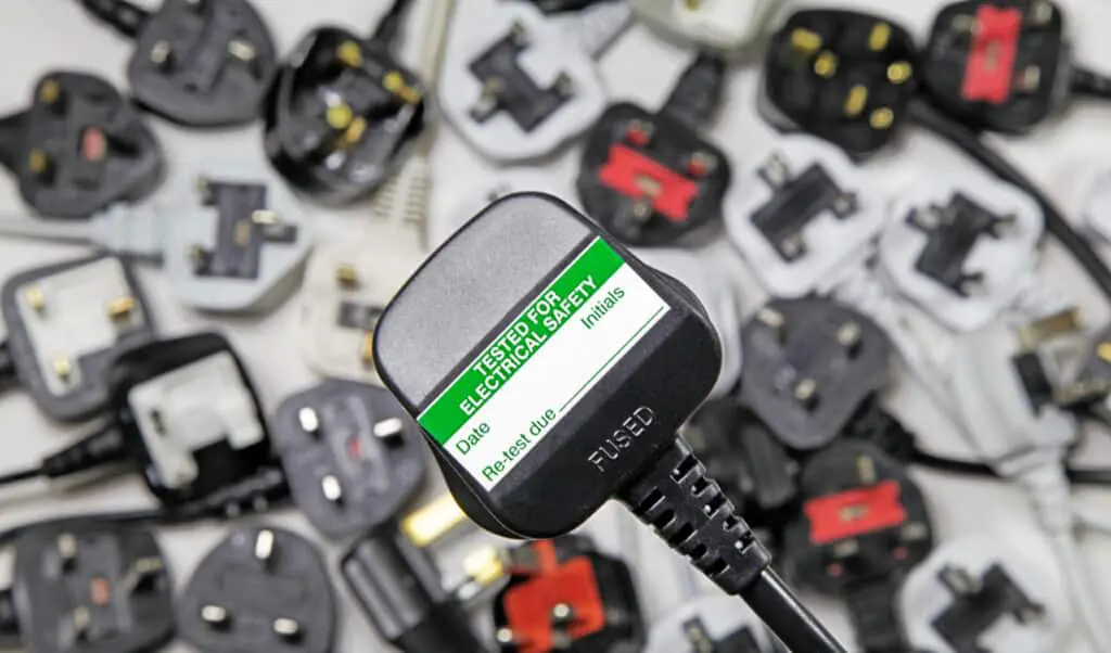 PAT testing label on fused plug.