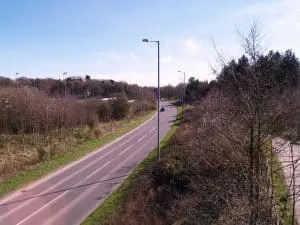 A road in Burntwood with surrounding greenery in view.